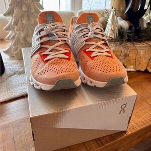 Woman’s On Running Athletic Shoes in Peach and White